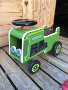 green Wooden tractor ride on toy