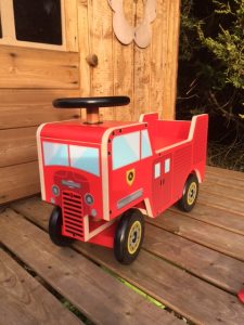 Wooden red Fire Engine ride on toy