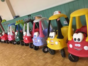 a collection of Little Tikes ride on toys