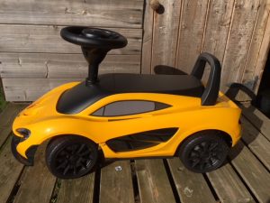 yellow Maclaren ride on toy