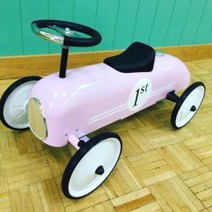 Retro racing car pink ride on toy