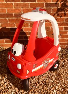 Red and white Little Tikes Fire Engine cozy coupe ride on toy
