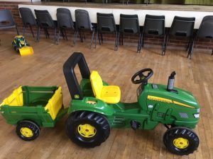 Large green John Deere tractor and Trailer ride on toy