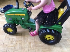 Large green John Deere tractor ride on toy