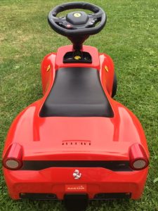 red Ferrari ride on toy